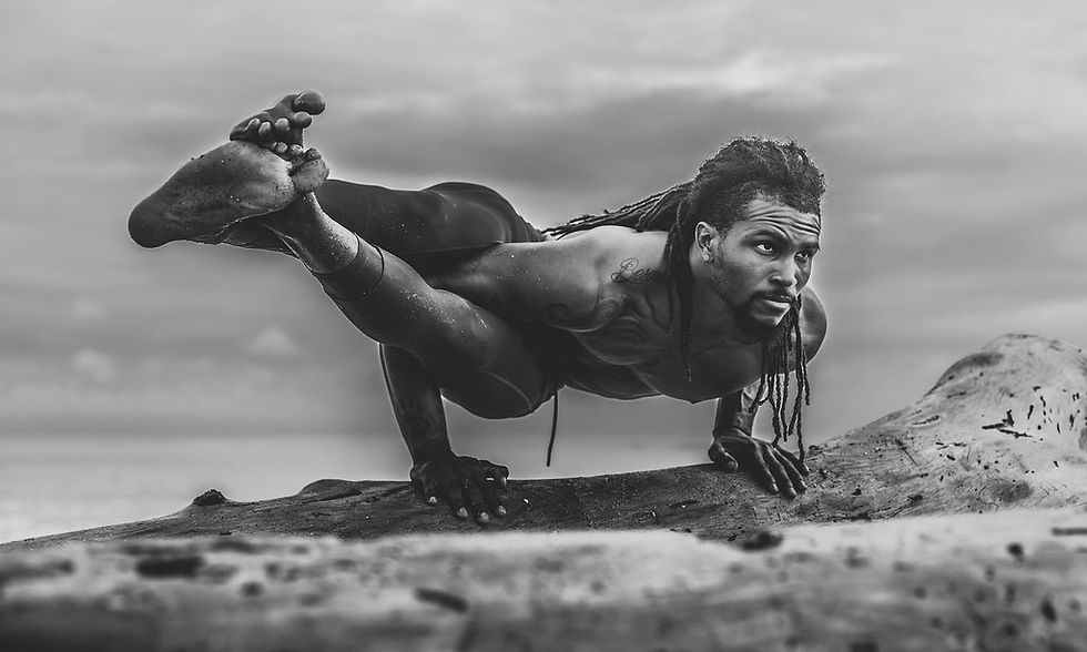 DJ Townsel balancing in yoga